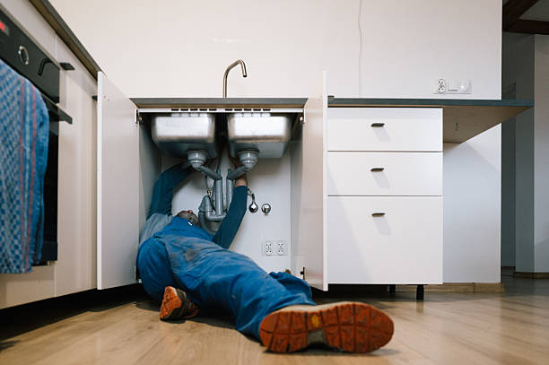 Professional Drain Cleaning technician working in Winchester, NH